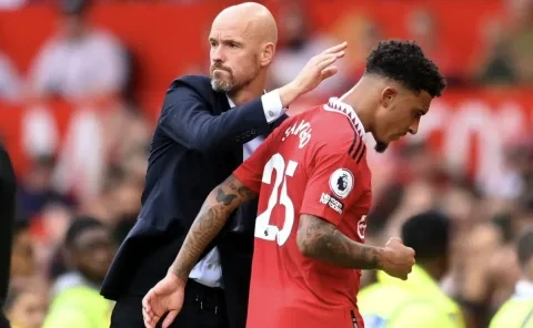 جادون سانشو ومدربه في مانشستر يونايتد إيريك تين هاغ (Telegraph)